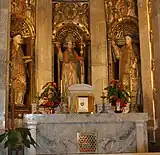 Les saints dans la chapelle des saints martyrs de la cathédrale de Tarragone; statues du XVIIe&nbsp;siècle et reliquaire avec des restes de tous les trois.
