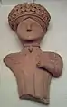 Fragment de statuette d'argile provenant d'Ibiza des IVe&nbsp;– IIIe&nbsp;siècles&nbsp;av. J.-C.