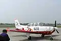 Un T-7 avec une peinture commémorative du 50e anniversaire de la base de Shizuhama (en)