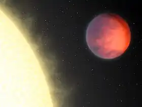 Vue d'artiste représentant υ And b comme un Jupiter chaud, avec son point chaud avancé de 80° par rapport au point substellaire (ici en orange)