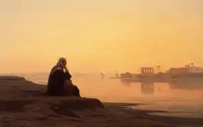 Un personnage regarde un lever de soleil sur le Nil