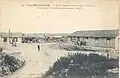 Le village en reconstruction vers 1920 avec ses baraquements en bois .