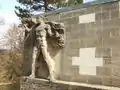 Bas-relief : Porte-flambeau de Willy Meller.