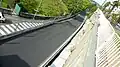 Ligne droite située avant le virage du pont Oscar, vue inversée