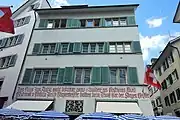 Lettrage sur le "Haus zum Kindli", Zurich, 1927 (restauré en 1965).