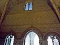 Détail d'un mur de la salle capitulaire donnant sur le cloître.